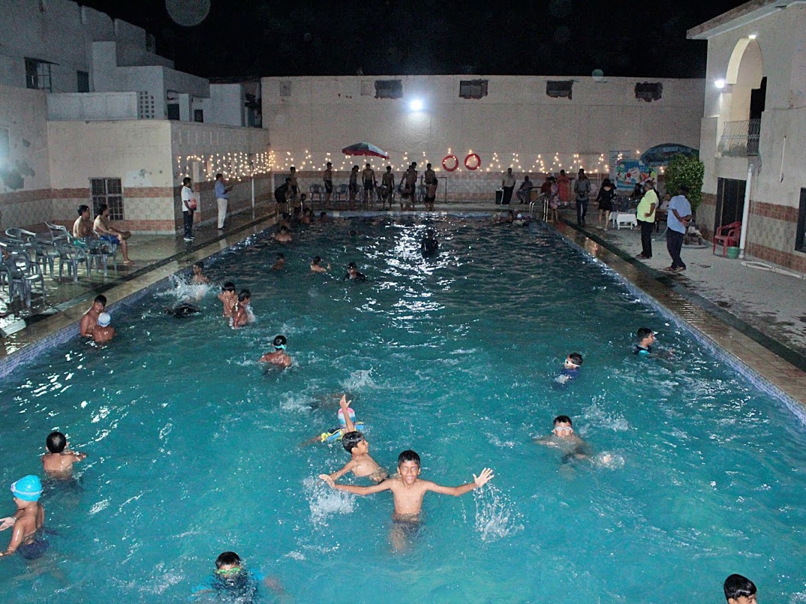 Students practising swimming in CSKM Public School's Olympic-standard pool